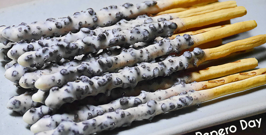 Pepero is a cookie stick, dipped in compound chocolate, manufactured by Lotte Confectionery in South Korea since 1983.